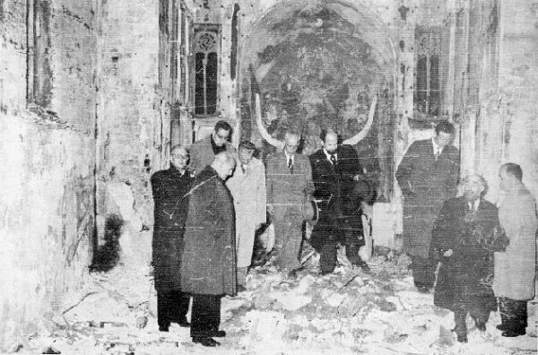 The committee of the World Council of Churches in the vandalized church of the Holy Transfiguration, in the cemetery of Sisli.