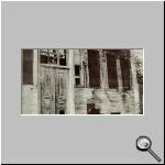 The front of a burnt Hellenic home. Thousands were looted and destroyed by the Turkish mobs.