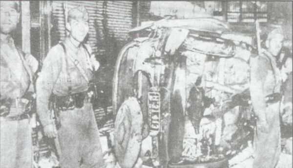 Turkish soldiers follow their long tradition of posing happily before the destruction of Hellenes.