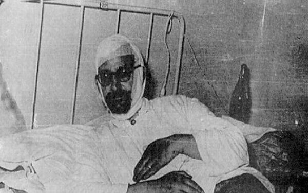 The Priest of the Monastery of Zoodochos, at the at the Baloukli hospital after his battery and injury. At least two Hellenic priests were tortured to death.