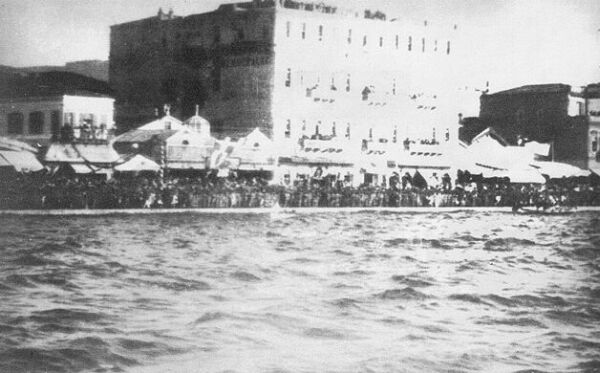 A naval festival at the crowded quay.