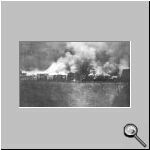 Buildings of the quay in flames.