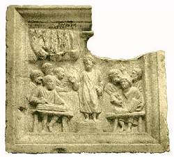 Scribes writing on wooden tablets